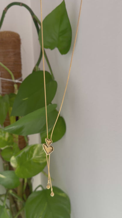 Colgante doble corazón gold